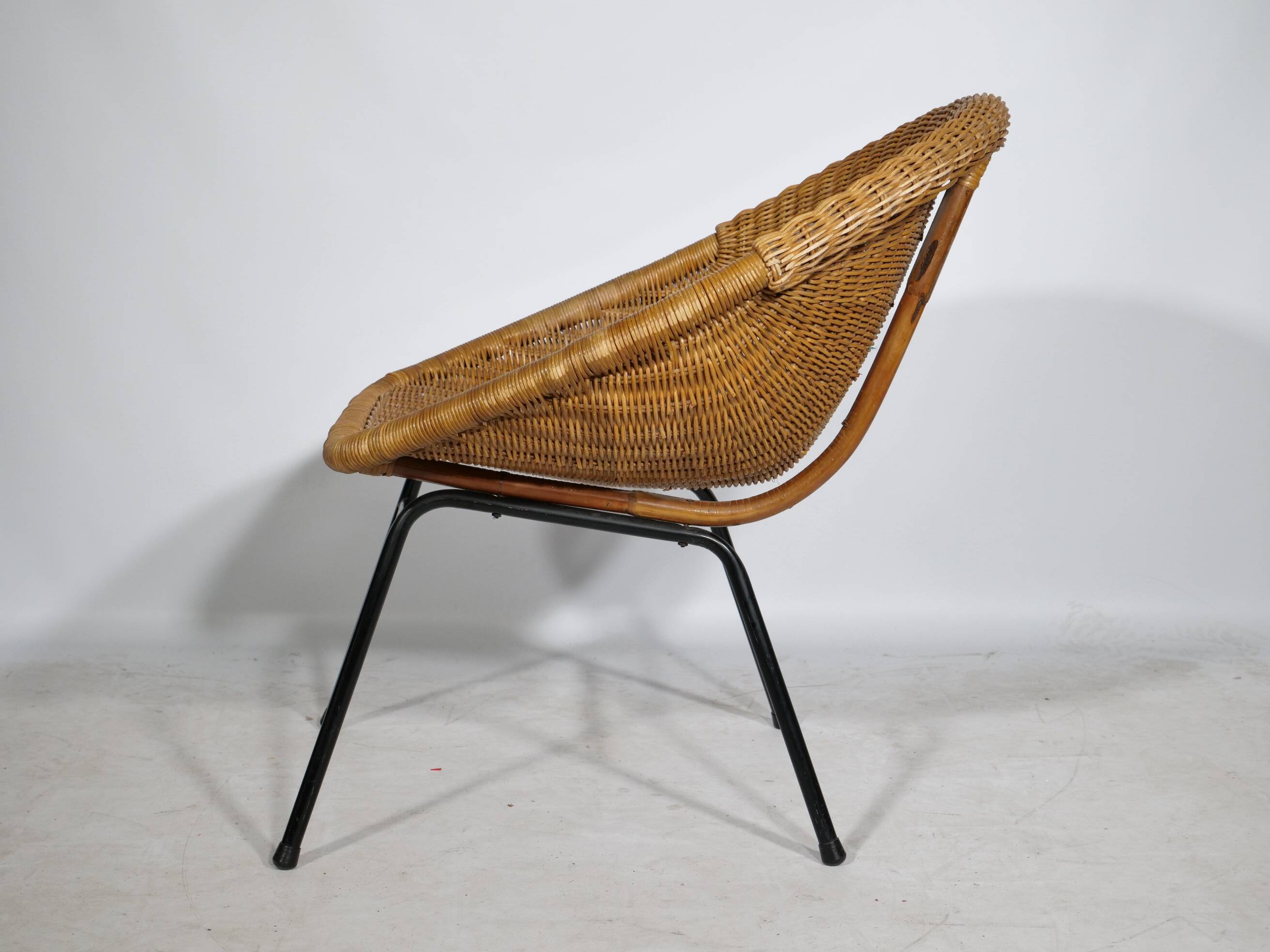 Woven rattan armchair from the 1960s