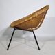 Woven rattan armchair from the 1960s