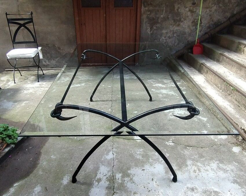 Wrought iron and glass dining table