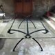 Wrought iron and glass dining table