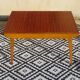 Extendable table, compass legs