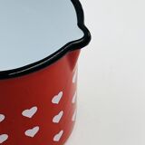 Vintage red enamelled measuring jug with hearts