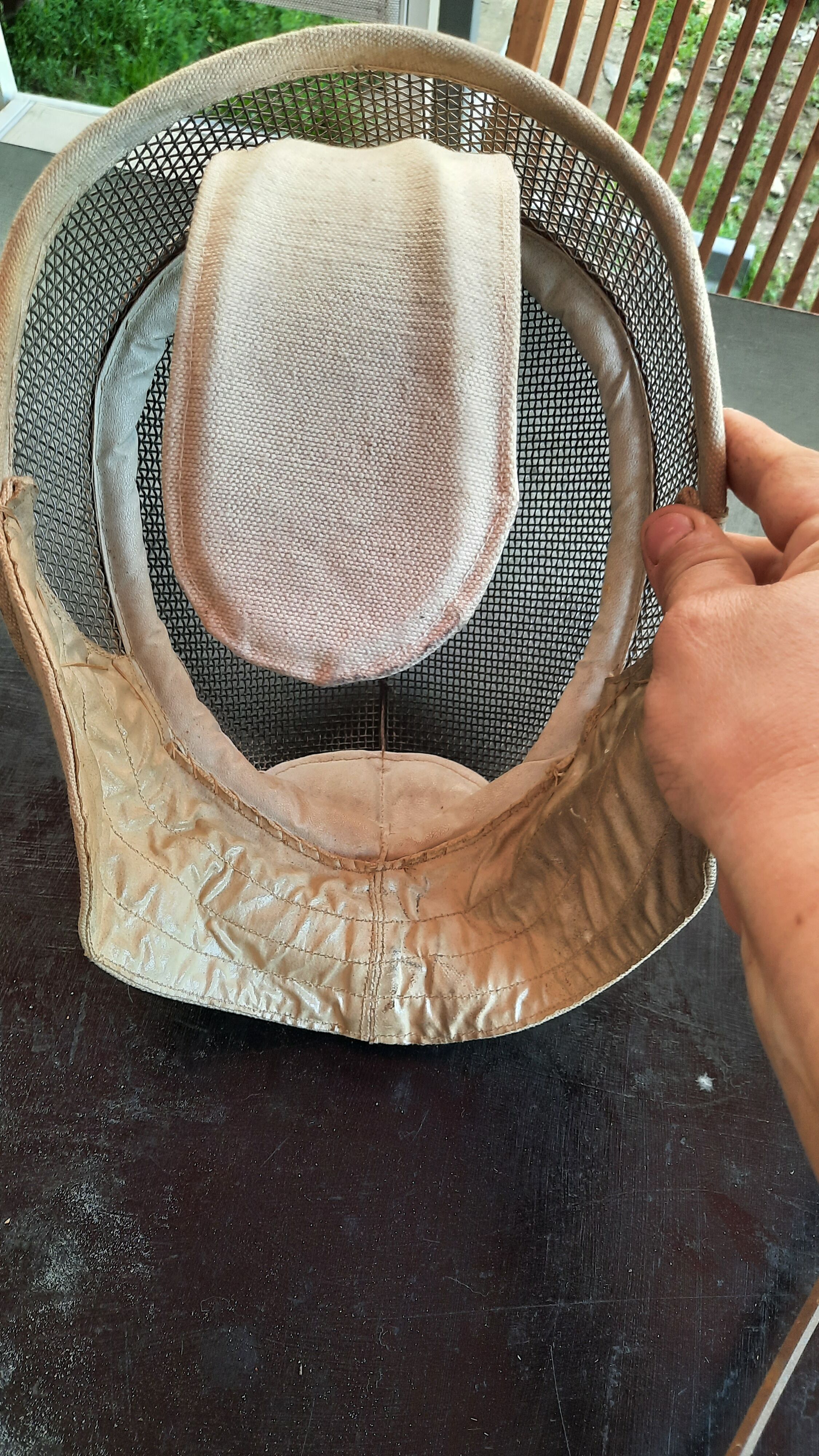 Pair of old fencing mask and foil