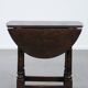 Antique English drop-leaf joint stool made of oak from the 18th century