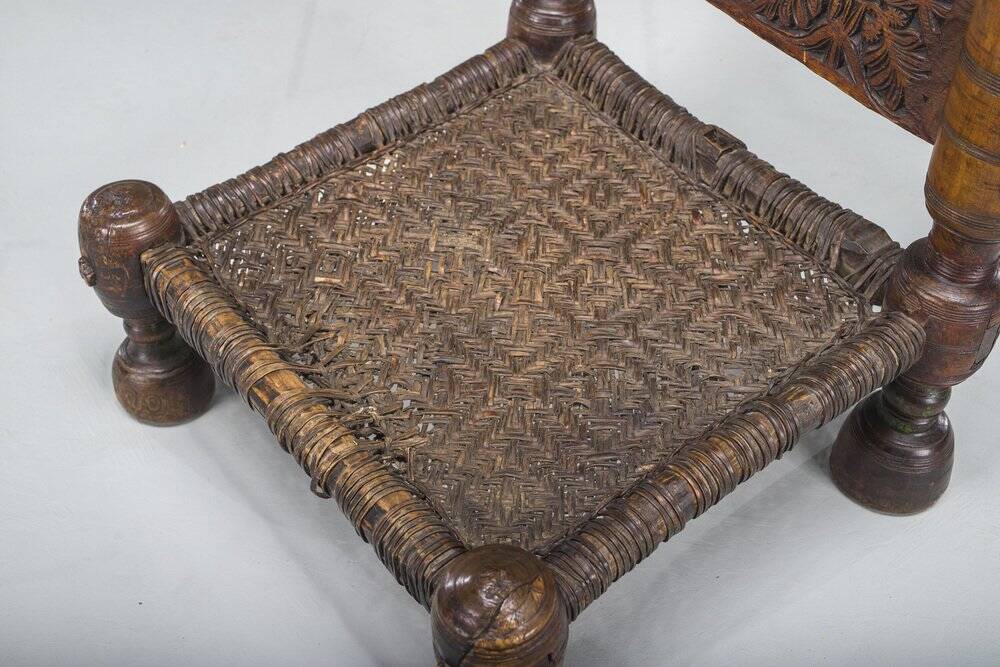 Early 20th century handmade low cedar chair, Nuristan, 1890s