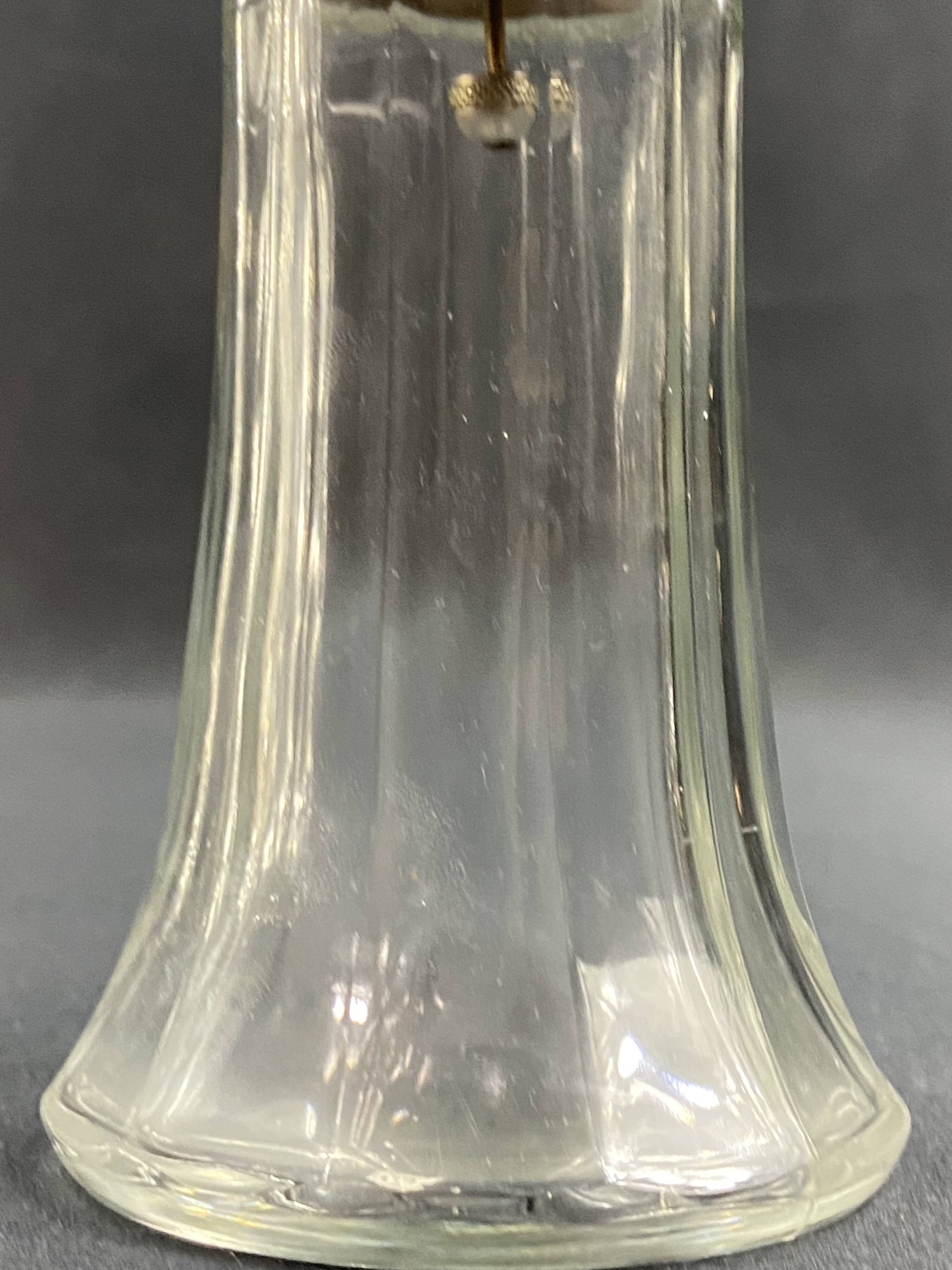 Glass and silver metal sugar shaker
