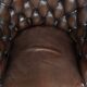 Brown cow leather Chesterfield office chair on wheels in English style