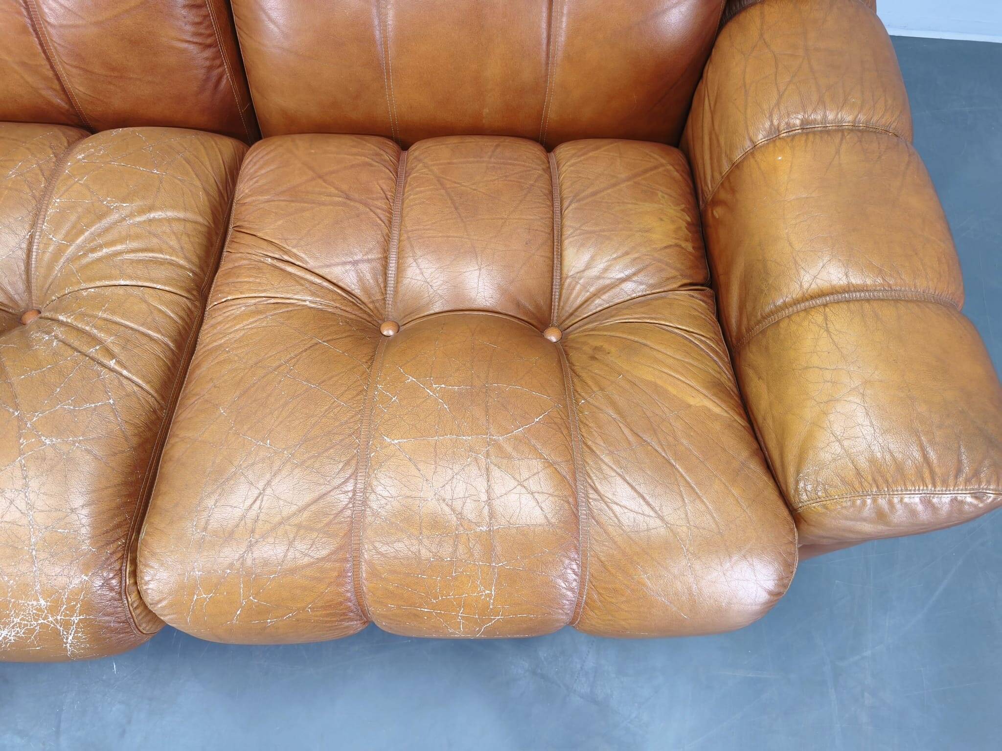 Three-seater sofa from the mid-century produced in Italy in the 1970s.