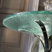 Pair of round coffee tables, glass, ca 1970