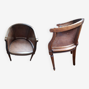 Pair of caned gondola armchairs