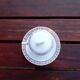 Tasse miniature en porcelaine