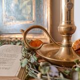 Cellar rat candle holder with brass pusher