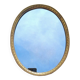 Oval mirror in gold metal
