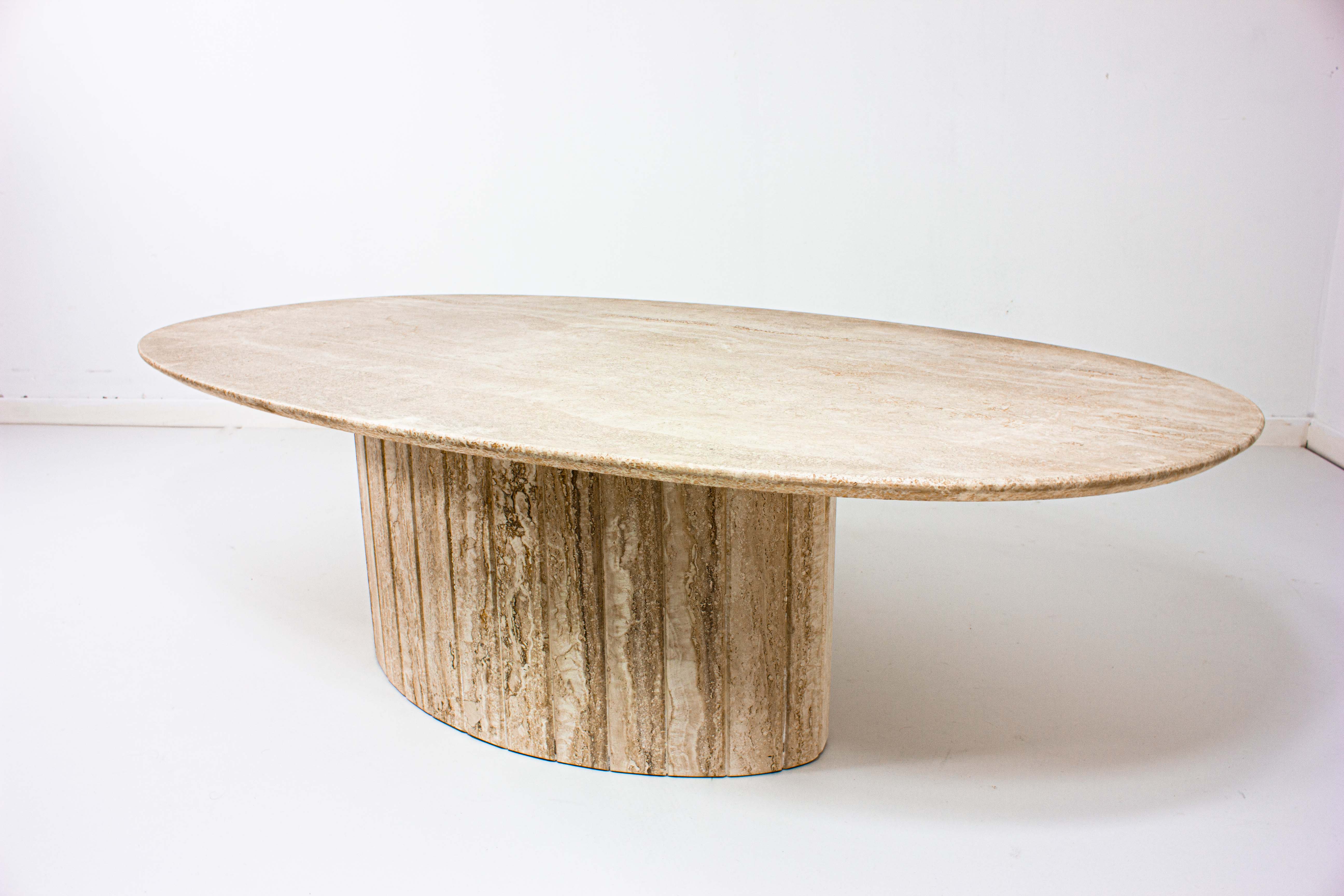 Oval Italian coffee table in travertin, 1970s
