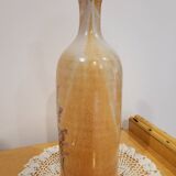 Bouteille fleurie en grès émaillé