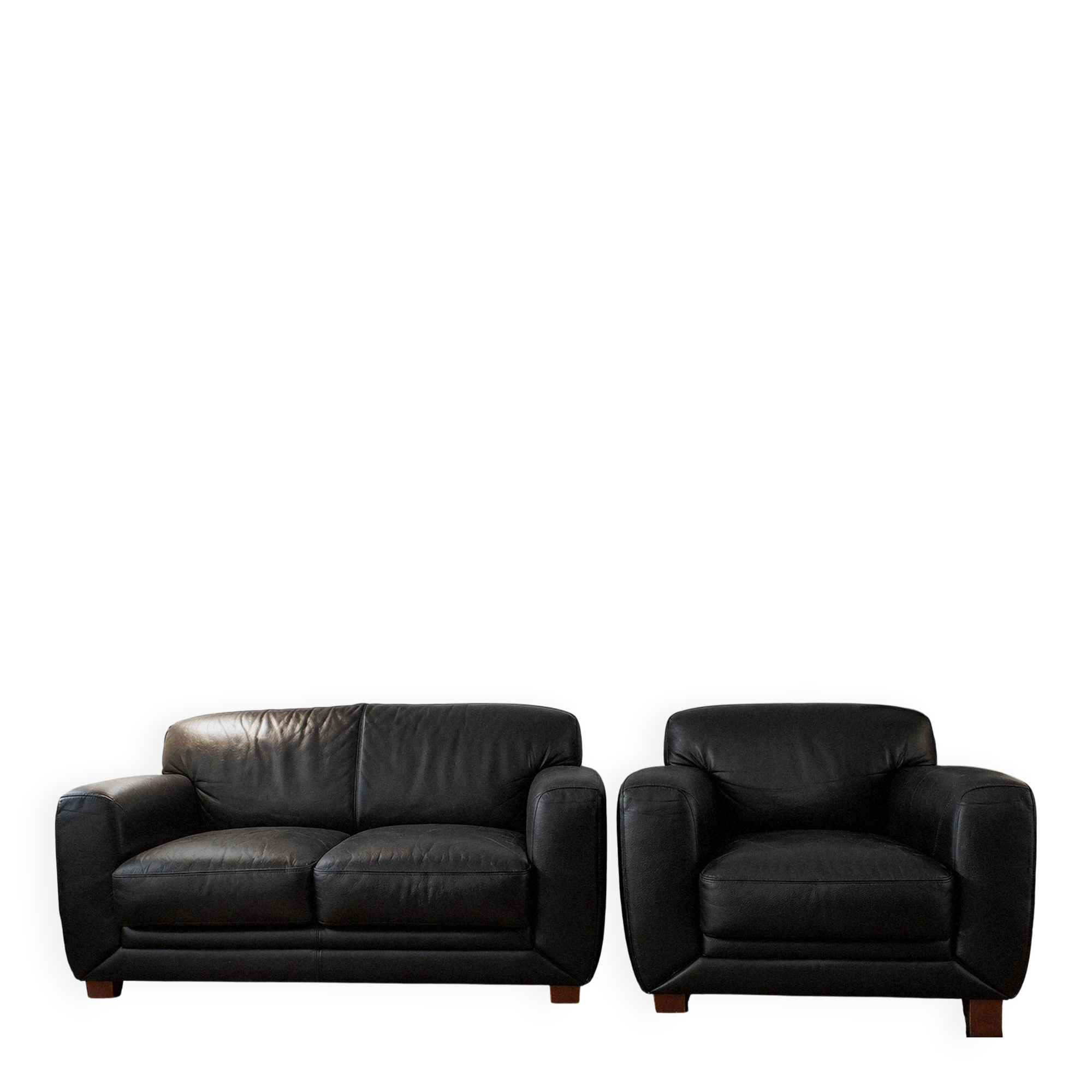 Leather sofa and armchair in black cowhide, brand Steiner.
