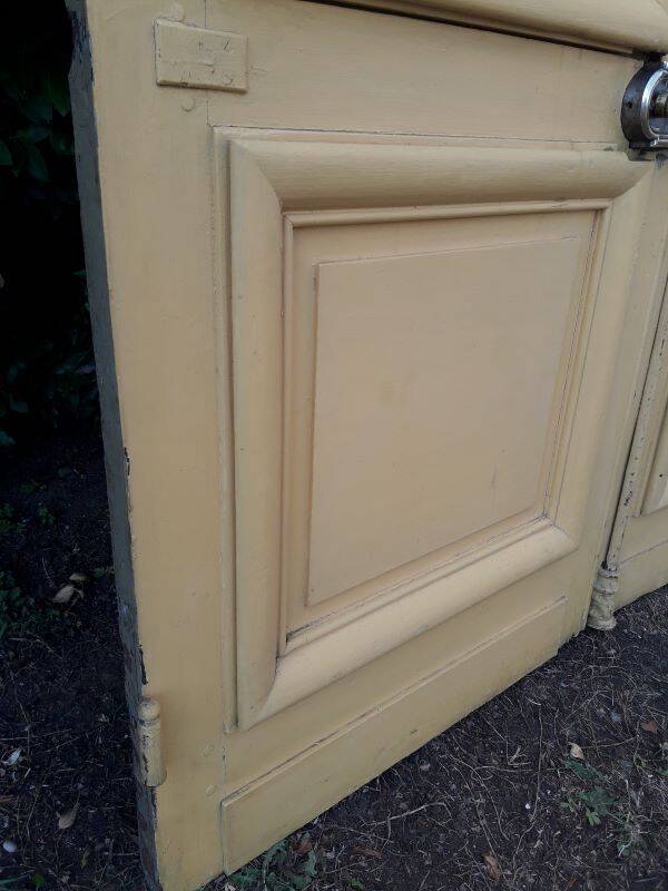 19th century double arched entrance door in oak with grilles and old glass