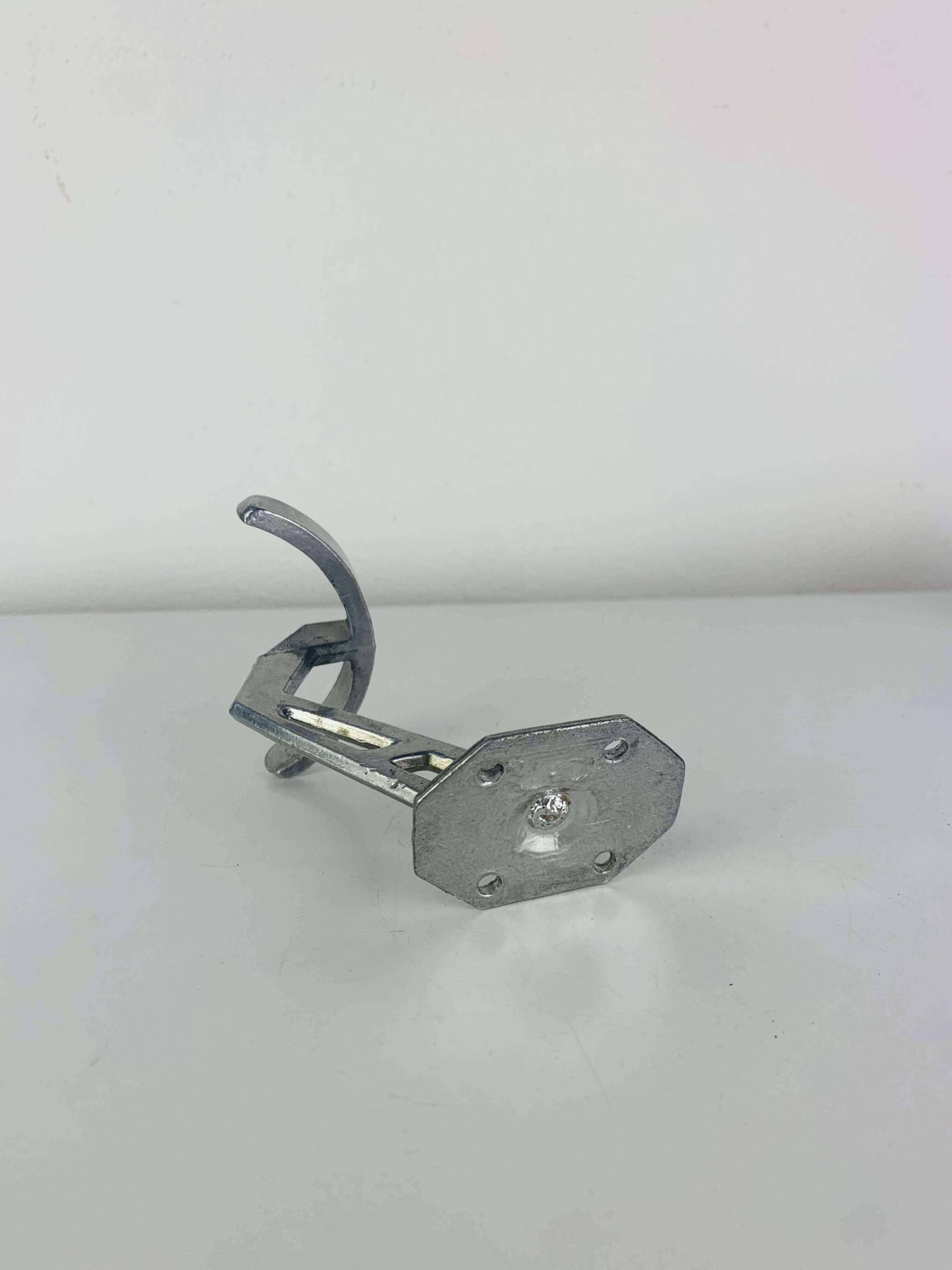 4 wall hooks in aluminium, 1950s