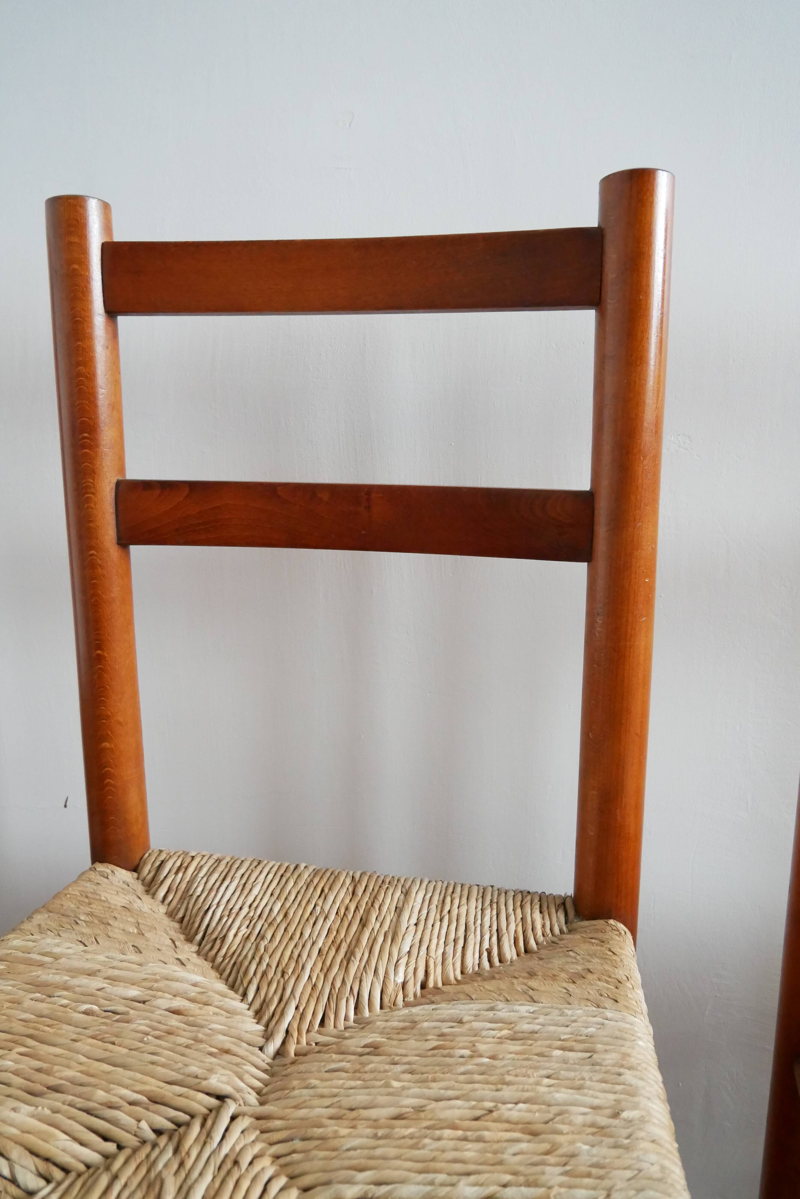 Set of 4 straw chairs and a stool