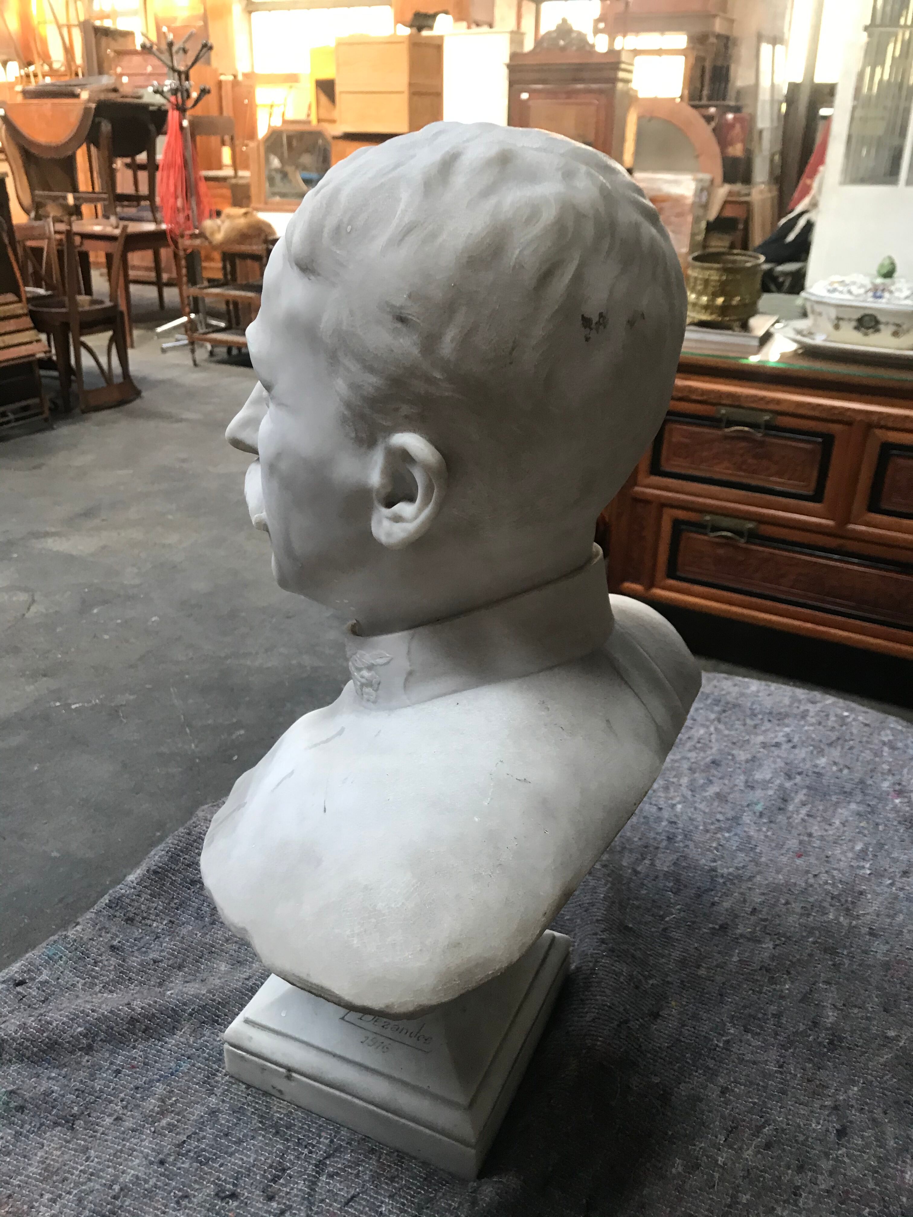 Man bust in square marble signed "F. Dezandes"