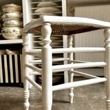 White wooden stool with caning