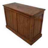 Two-sided paneled counter, bottle storage