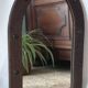 Old handcrafted Gothic style wooden mirror