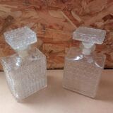 Pair of molded glass whiskey liqueur carafes + vintage stoppers