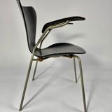 Arn Jocobsen black lacquered wooden armrest chair in the year 50