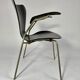 Arn Jocobsen black lacquered wooden armrest chair in the year 50