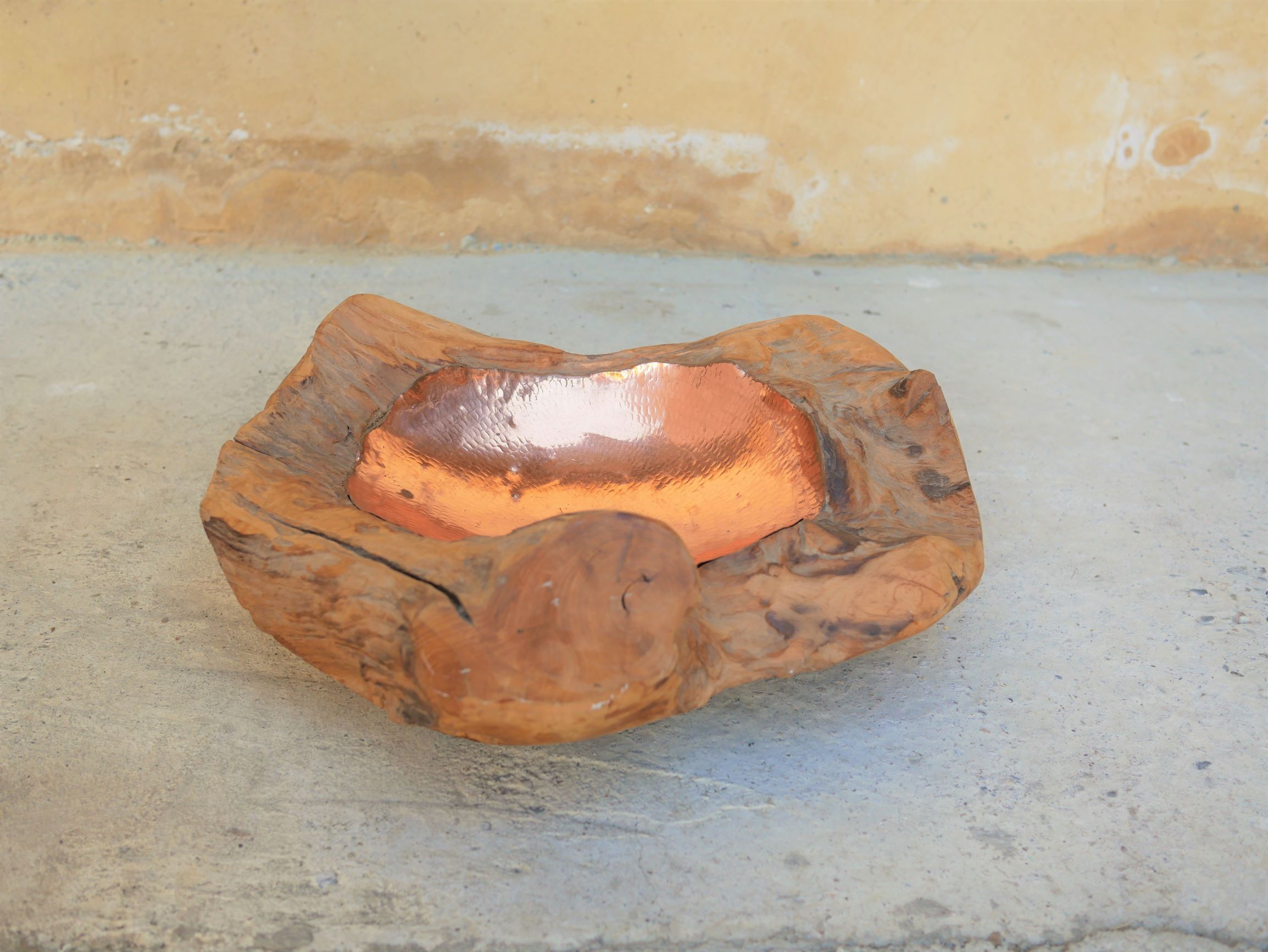 Empty wooden and copper pocket