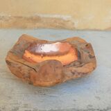 Empty wooden and copper pocket