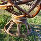 Fauteuil vintage pivotant en bambou et rotin