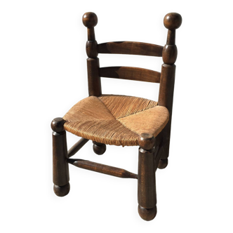 Straw low chair in the style of Charles Dudouyt