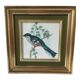 Table reproduction "beautiful colorful bird", gilded wood frame and green fabric