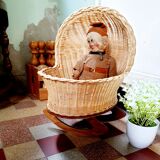 Cradle vintage wicker doll