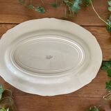 Antique serving dish in Longchamp earthenware.