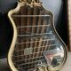 Antique bevelled baroque mirror in patinated wood
