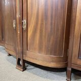Art Nouveau mahogany buffet with clock in the style of G. Serrurier Bovy.