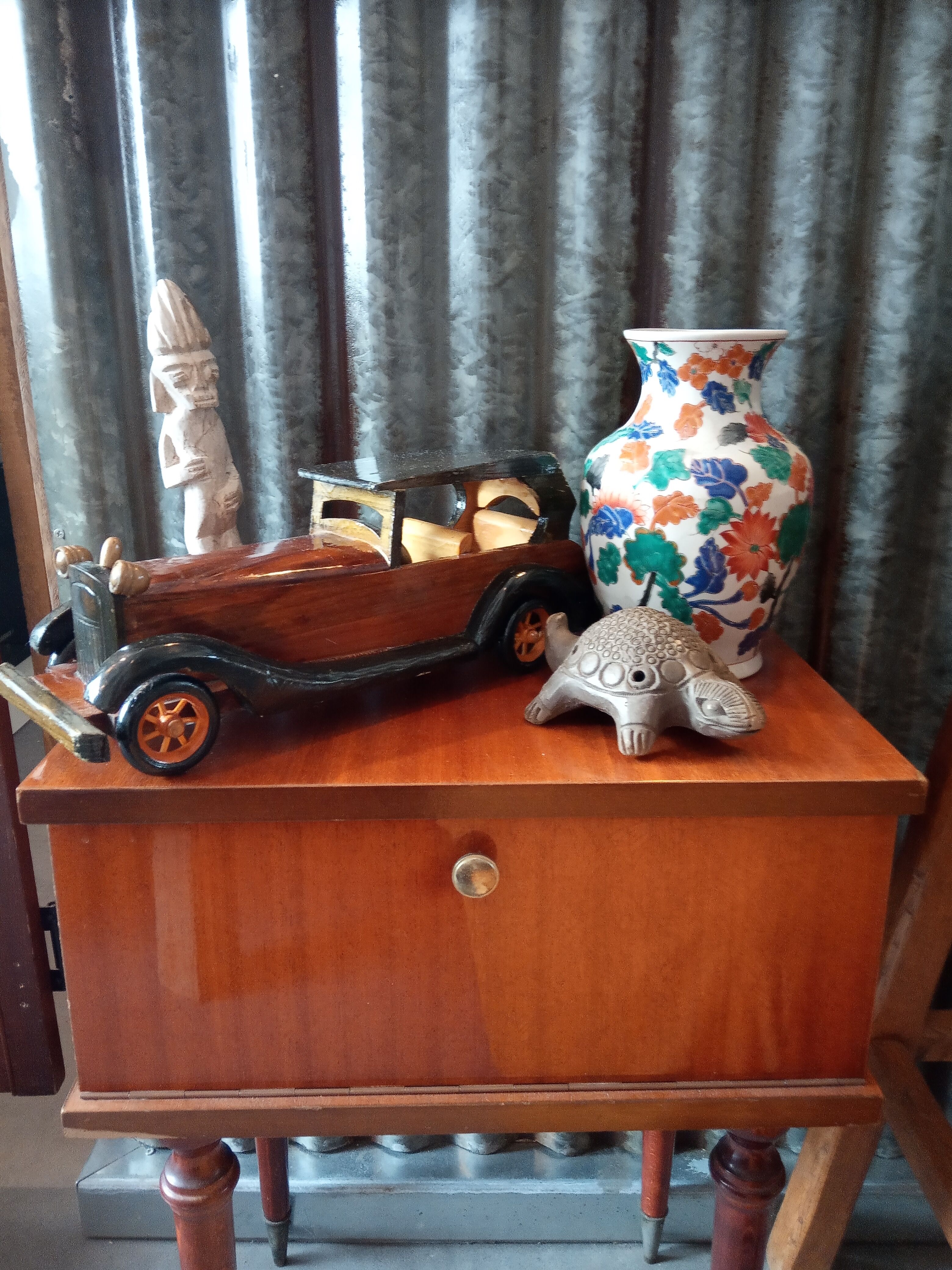 Toy car made of varnished wood
