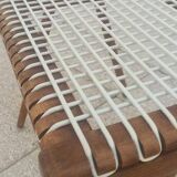 Footrest Georges Tigien, from the 60s. Light teak structure
