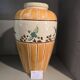 Orange and green ceramic vase with duck motif