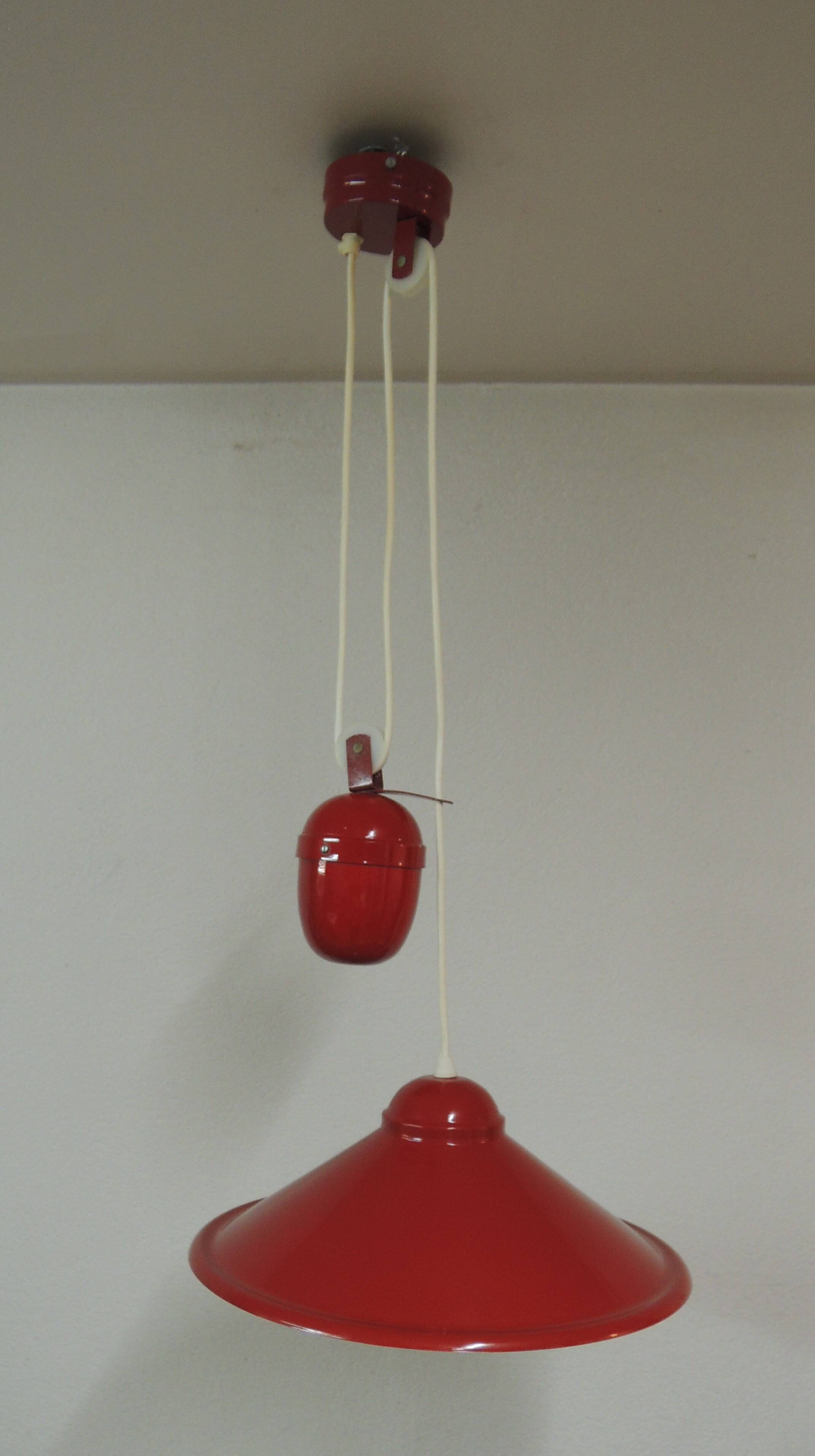 Red metal suspension rises and lowers.