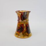 Beautiful ceramic pitcher in fire colors