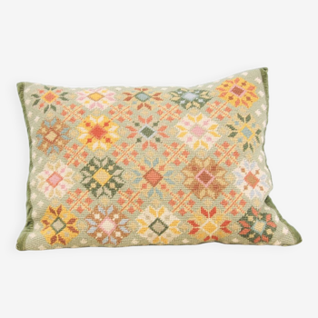 green embroidered vintage cushion