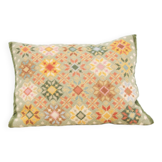 green embroidered vintage cushion