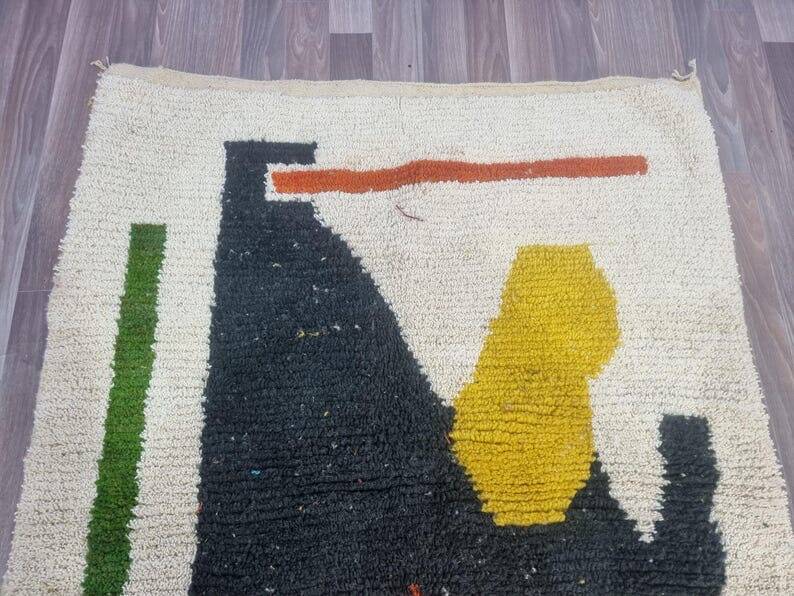 Handmade traditional Moroccan rug with colourful patterns, size 140x260 cm.