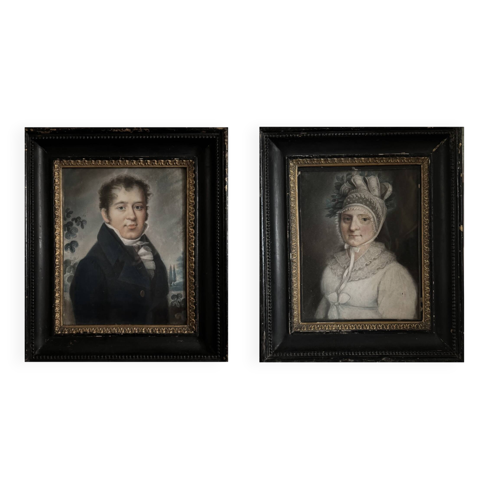 Pair of pastel portraits