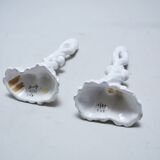 Pair of white ceramic candlesticks