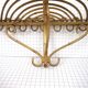 Half-moon rattan shelf and coat holder